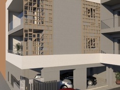 Fünfstöckiges Mehrfamilienhaus mit offener ebenerdiger Parkfläche zwischen Pilotis mit Untergeschoss und Dachgeschoß