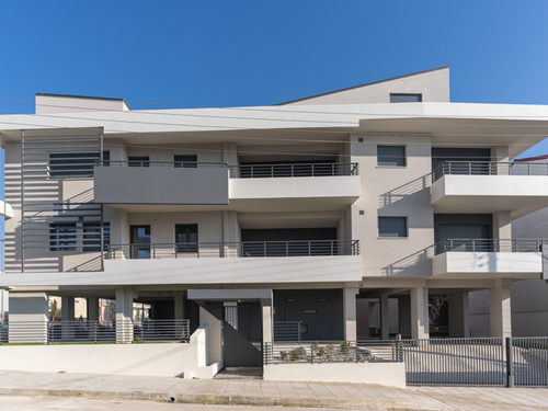 New two-storey apartment building with pilotis and basement